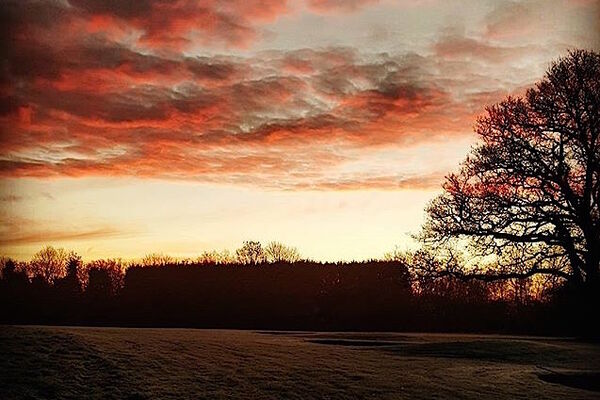 #caption-121 Autumnal sunset across the course
