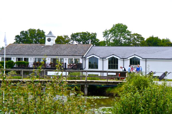 #caption-184 Club house from the lake
