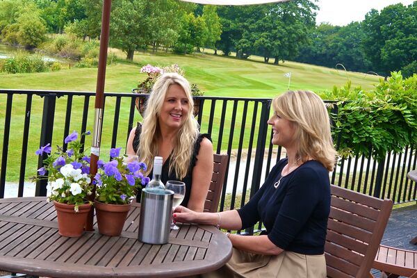 #caption-187 On the balcony overlooking the course
