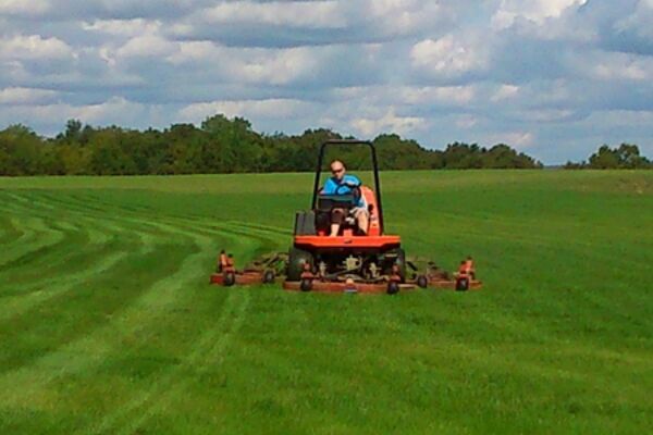 #caption-46 Mowing the Driving Range
