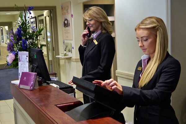 #caption-173 Professional communication at Reception